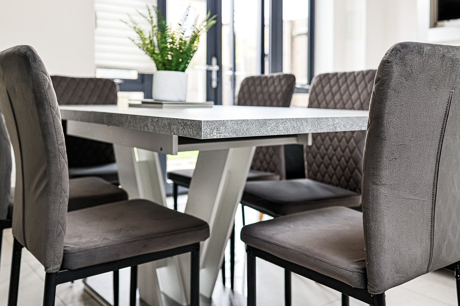 Dining room with velvet chairs